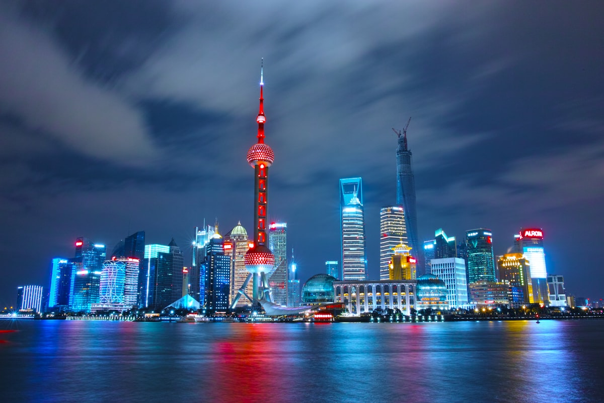 Shanghai Pudong skyline at night with the Bund in foreground