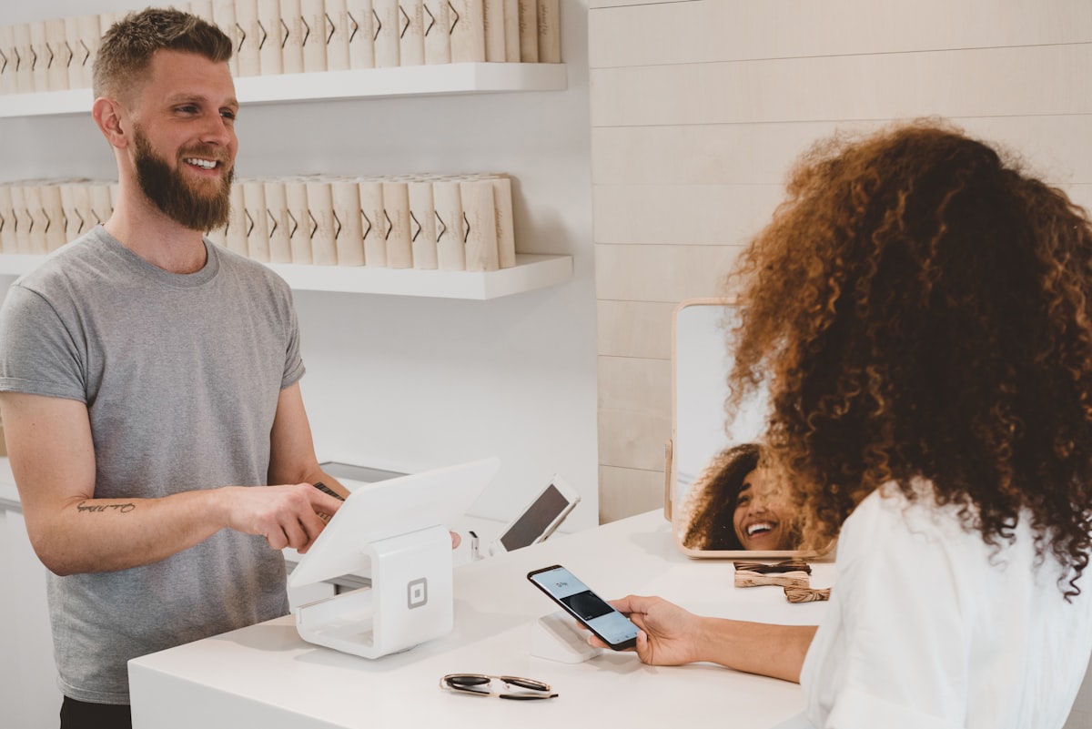 Mobile phone scanning QR code to pay