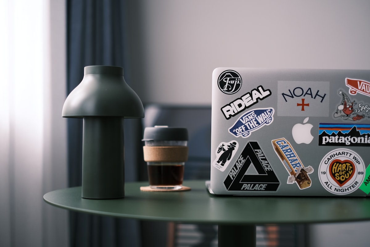 Laptop on desk in modern workspace with natural light, China remote work setup
