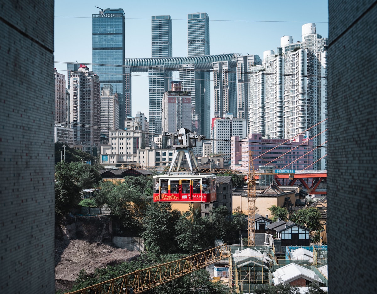 Chongqing skyline with layered bridges and river at dusk